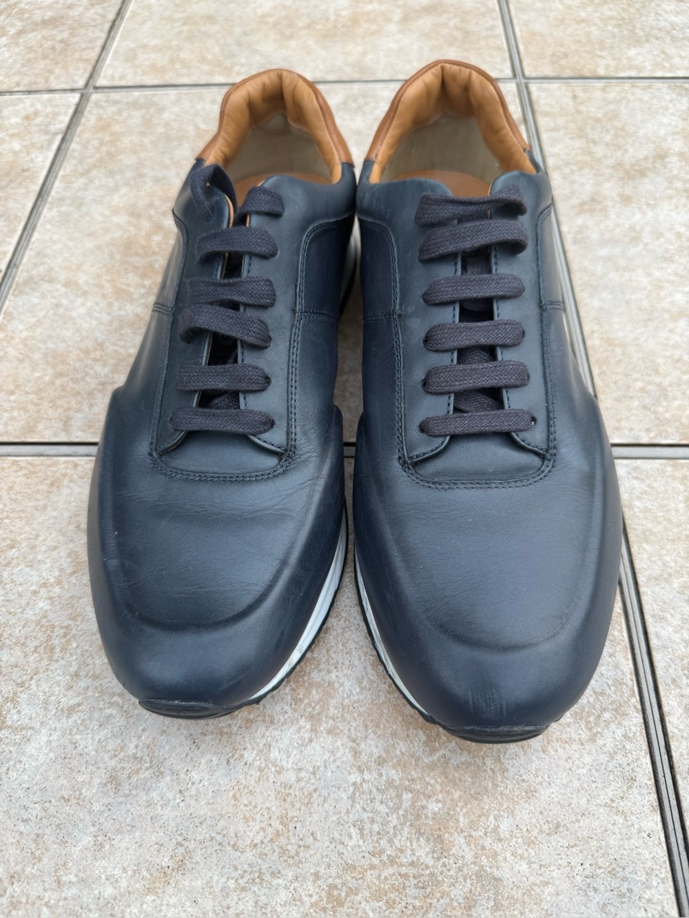 Hugo Boss Legacy Runn sneakers in a dark blue color with a tan contrast lining